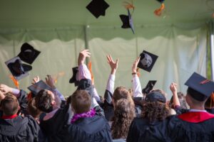 graduation day with students tossing their caps in the air